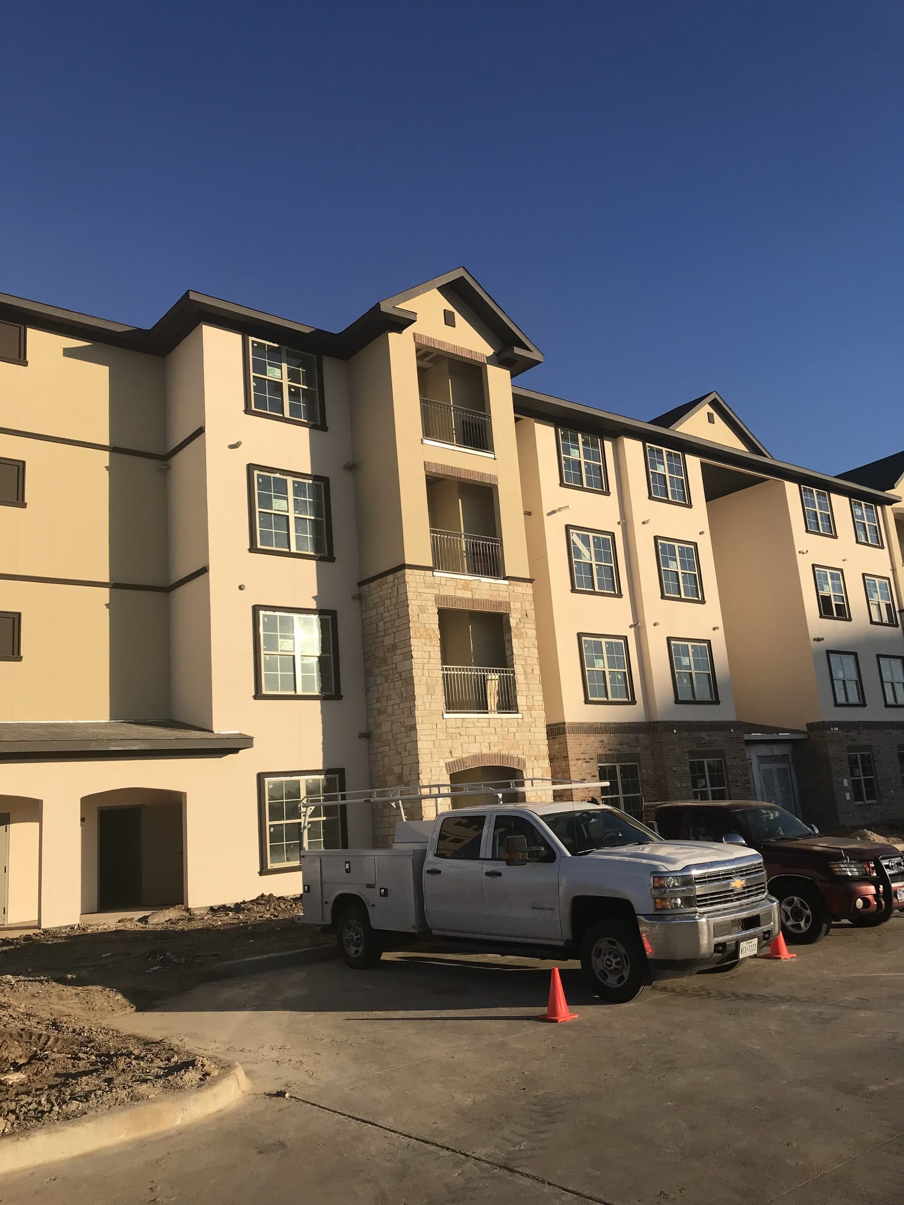 The near-complete four-story elevation at golden hour