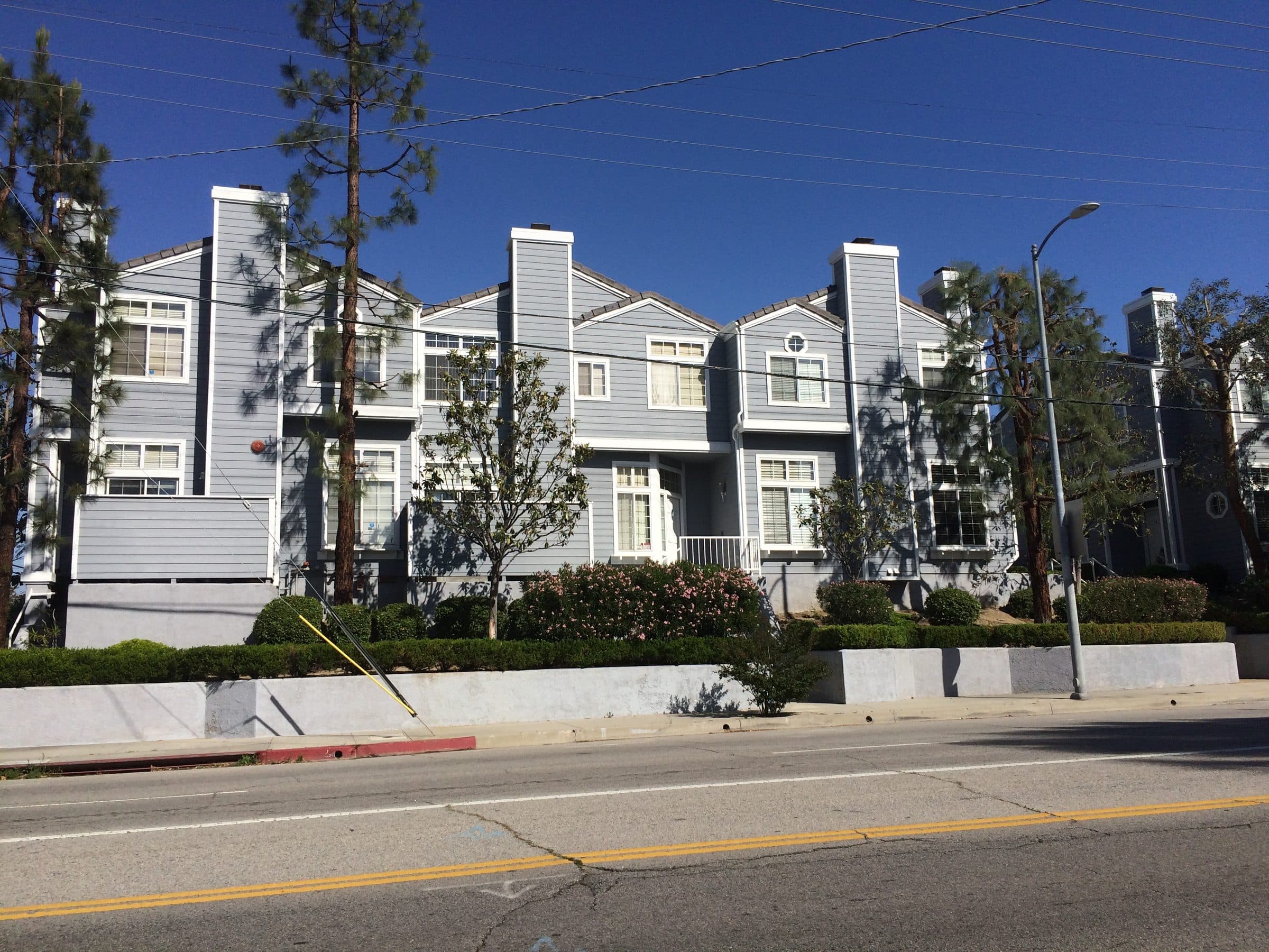 The in-fill townhome row from across the street, twenty-five years on